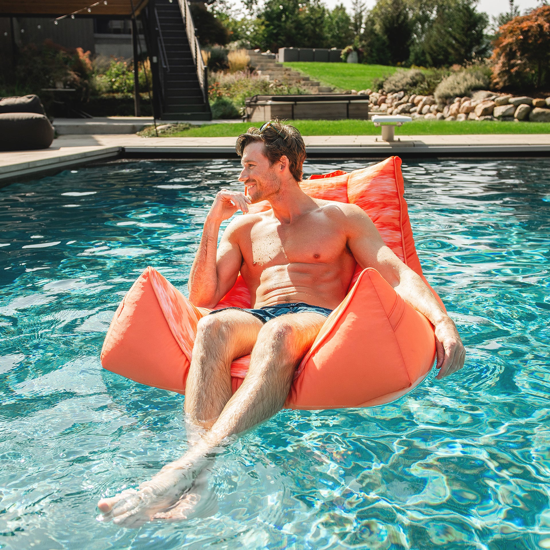 21822314_Big-Joe_Captains-Float_Pool-Float_Peach-Glow_Double-Sided-Mesh_Lifestyle-6 Captain's Pool Float - Image 1
